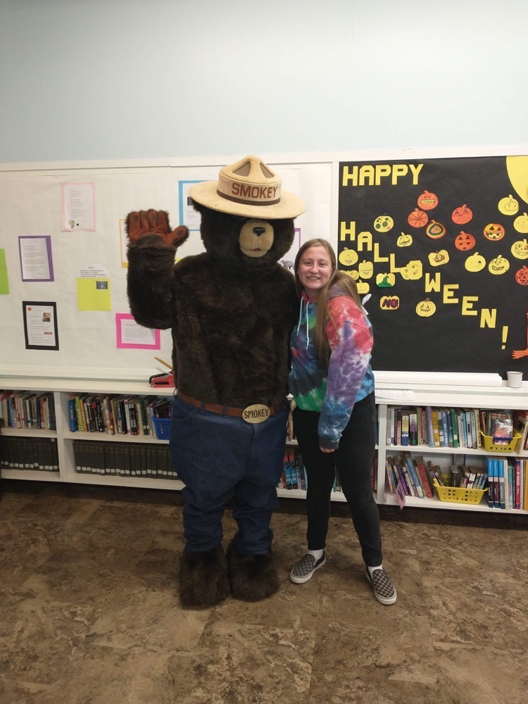 Smokey Bear with students 